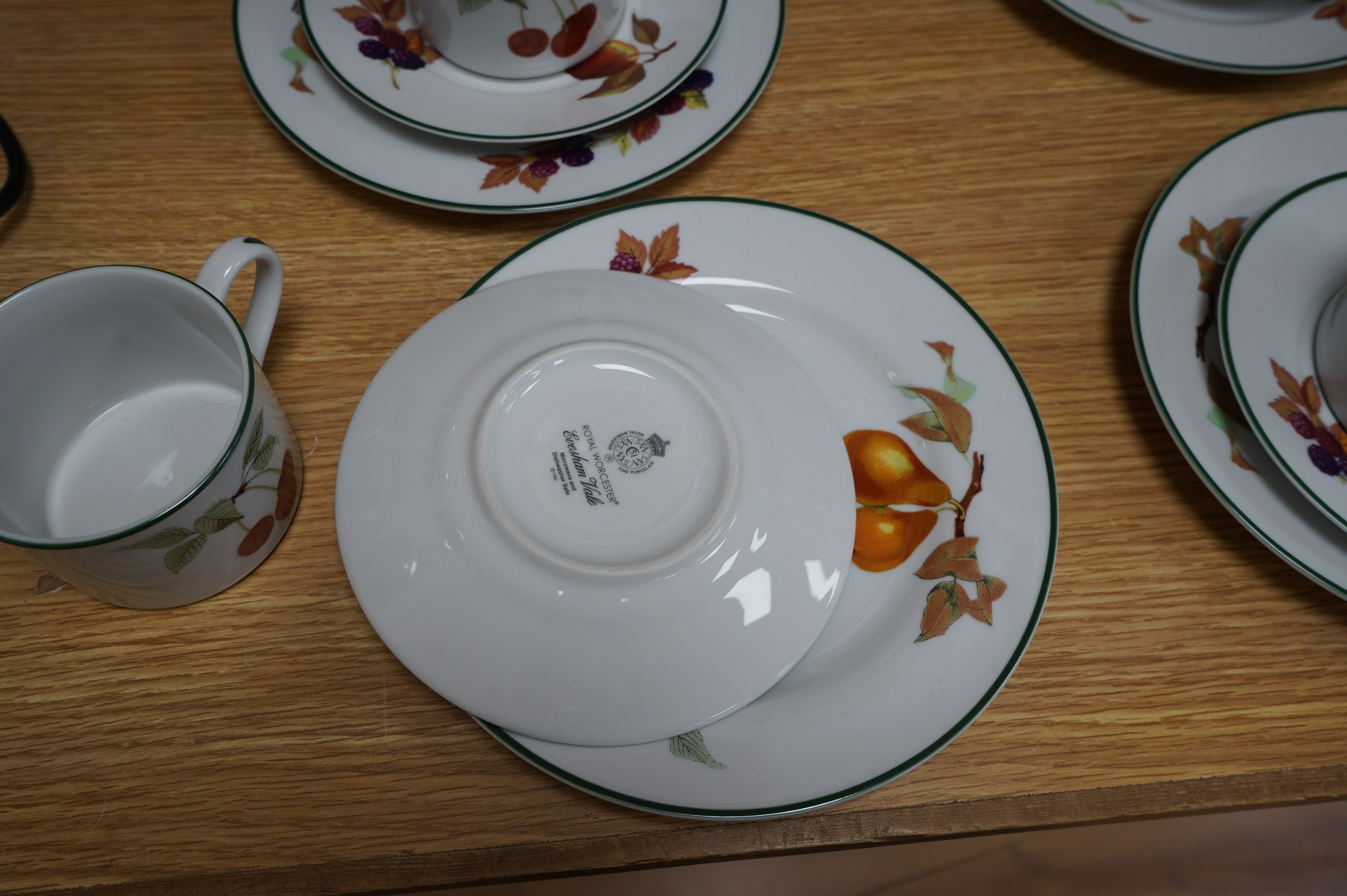 A Royal Worcester ‘Evesham Vale’ pattern part breakfast service (40). Condition - good